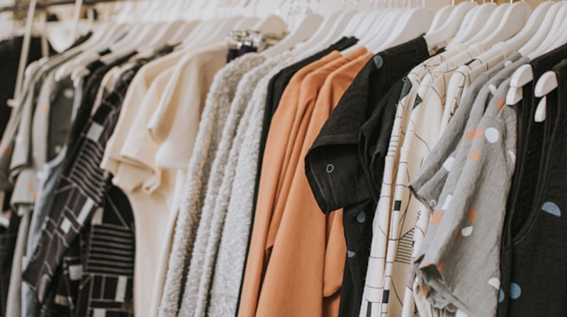 Elegant fashion items arranged on a boutique table